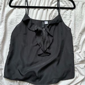 Black tank with front zip and ruffle detailing